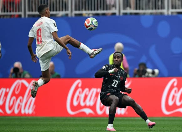 (260705) -- HOUSTON, July 5, 2026 -- Azzedine Ounahi (L) of Morocco competes with Richie Laryea of Canada during the round of 16 match between Canada and Morocco at the 2026 FIFA World Cup, WM, Weltmeisterschaft, Fussball at Houston Stadium in Houston, the United States, July 4, 2026. ) (SP)U.S.-HOUSTON-FOOTBALL-FIFA WORLD CUP-ROUND OF 16-CAN VS MAR XiaoxYijiu 
