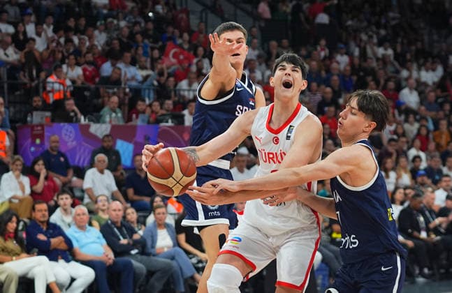 Turkiye v Serbia - FIBA U17, U 17 Basketball World Cup ISTANBUL, TURKIYE - JULY 04: Darius Karutasu (2) of Turkiye in action against Vuk Stepanovic (7) of Serbia during the FIBA Under-17 Basketball World Cup match between Turkiye and Serbia at the Basketball Development Center in Istanbul, Turkiye, on July 4, 2026. Esra Bilgin Anadolu Istanbul Turkey. Editorial use only. Please get in touch for any other usage.  Copyright: x2026xAnadoluxEsraxBilginx