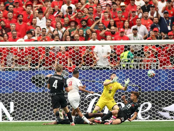 (260705) -- HOUSTON, July 5, 2026 -- Azzedine Ounahi (2nd L) of Morocco shoots and scores during the round of 16 match between Canada and Morocco at the 2026 FIFA World Cup, WM, Weltmeisterschaft, Fussball at Houston Stadium in Houston, the United States, July 4, 2026. ) (SP)U.S.-HOUSTON-FOOTBALL-FIFA WORLD CUP-ROUND OF 16-CAN VS MAR LixMing 