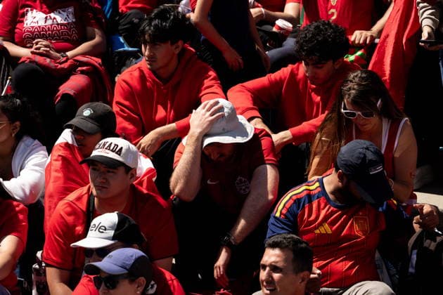 July 4, 2026, Vancouver, Bc, CANADA: Canadian fans react to Morocco scoring against Canada during a World Cup round of 16 soccer match, at Jack Poole Plaza, in Vancouver, on Saturday, July 4, 2026. Canada News - July 4, 2026  - ZUMAc35_ 20260704_zaf_c35_085 Copyright: xEthanxCairnsx