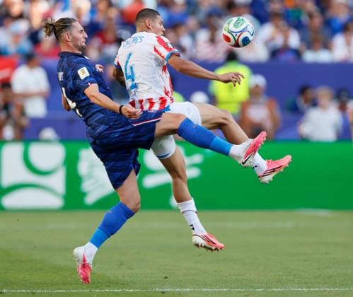 Paraguay v France: Round of 16 - FIFA World Cup, WM, Weltmeisterschaft, Fussball 2026 Adrien Rabiot of France and Juan Jose Caceres of Paraguay challenge during the FIFA World Cup 2026 Round Of 16 match between Paraguay and France at Philadelphia Stadium on July 4, 2026 in Philadelphia, Pennsylvania. Philadelphia Philadelphia Stadium PA United States Copyright: xAllstarxPicturexLibraryxLtdx