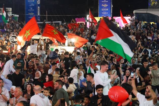 Palestinians Gather in Al-Bireh to Support Morocco in World Cup Match AL-BIREH, WEST BANK JULY 4, 2026: Palestinians gather at a public World Cup fan zone in Al-Bireh, near Ramallah, to watch and support Morocco during its FIFA World Cup, WM, Weltmeisterschaft, Fussball 2026 Round of 16 match against Canada. The event was attended by Palestinian Football Association President Jibril Rajoub, representatives of the Moroccan Embassy to Palestine and other public figures. Fans watched the match on a giant outdoor screen in an atmosphere of celebration and support for the Moroccan national team, Nationalteam Al-Bireh Palestine, State of Copyright: x xSalmanxMohsenxAlkhatibx xJNAxPressx