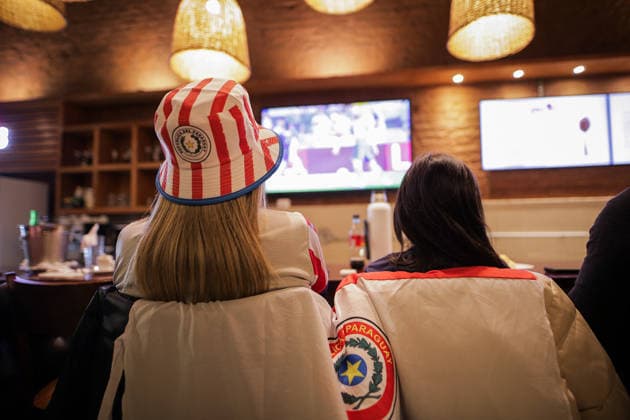 Paraguay football team supporters in Asuncion watch FIFA World Cup, WM, Weltmeisterschaft, Fussball 2026 - Round of 16 ASUNCION, PARAGUAY – JULY 4: A woman and her daughter watches the game against France at a shop of Downtown Asuncion during the FIFA World Cup Round of 16, in Asuncion, Paraguay, on July 4, 2026. Nathalia Aguilar Anadolu Asuncion Paraguay. Editorial use only. Please get in touch for any other usage.  Copyright: x2026xAnadoluxNathaliaxAguilarx