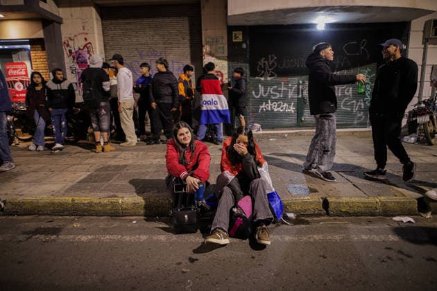 Paraguay football team supporters in Asuncion watch FIFA World Cup, WM, Weltmeisterschaft, Fussball 2026 - Round of 16 ASUNCION, PARAGUAY – JULY 4: Two girl react after France s victory at a empty street in downtown Asuncion during the FIFA World Cup Round of 16, in Asuncion, Paraguay, on July 4, 2026. Nathalia Aguilar Anadolu Asuncion Paraguay. Editorial use only. Please get in touch for any other usage.  Copyright: x2026xAnadoluxNathaliaxAguilarx