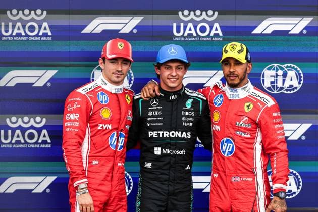 (260705) -- LONDON, July 5, 2026 -- Pole-sitter and Mercedes Italian driver Kimi Antonelli (C) poses with second placed Ferrari s Charles Leclerc (L) of Monaco and third placed Ferrari s British driver Lewis Hamilton after the qualifying session of the Formula One British Grand Prix 2025 at the Silverstone Circuit in Silverstone, Britain, July 4, 2026. (Photo by Xinhua) (SP)BRITAIN-SILVERSTONE-F1-BRITISH GRAND PRIX-QUALIFYING JinxCheng 