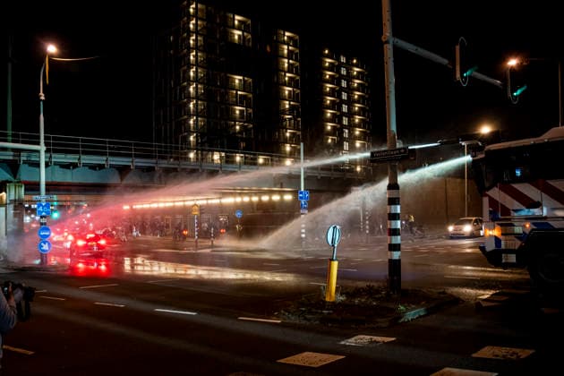July 4, 2026, Den Haag, South Holland, Netherlands: 4 July 2026, The Hague, the Netherlands. Dutch police deploy water cannons against celebrating fans of Morocco. Morocco fans celebrate in the Schilderswijk neighbourhood of The Hague, after Morocco defeated Canada 3-0 in the FIFA World Cup, WM, Weltmeisterschaft, Fussball 2026 Round of 16 to advance to the quarter-finals. Fans Celebrate Morocco Win At The World Cup.  - ZUMAp202 0860756873st Copyright: xJamesxPetermeierx