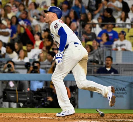 Los Angeles Dodgers first baseman Freddie Freeman hits a solo home run in the sixth inning against the San Diego Padres at Dodger Stadium in Los Angeles on Saturday, July 4, 2026.  LAP2026070402 JIMxRUYMEN