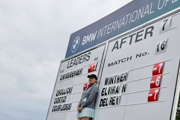 BMW International Open golf tournament A woman stands in front of a leaderboard during the final round of the BMW International Open golf tournament in Munich, Germany, 05 July 2026. MUNICH Germany  Copyright: xANNAxSZILAGYIx