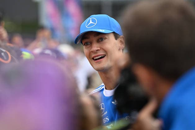 RECORD DATE NOT STATED 5th July 2026; Silverstone Circuit, Northamptonshire, England; FIA Formula 1 2026 British F1 Grand Prix; Race Day; Oliver Bearman of Haas signs autographs on arrival at Silverstone SimonxWest