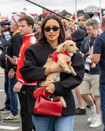 RECORD DATE NOT STATED 5th July 2026; Silverstone Circuit, Northamptonshire, England; FIA Formula 1 2026 British F1 Grand Prix; Race Day; Scuderia Ferrari HP driver Charles Leclercs wife Alexandra Leclerc and dog Leo arrive in the paddock TimxWilliams