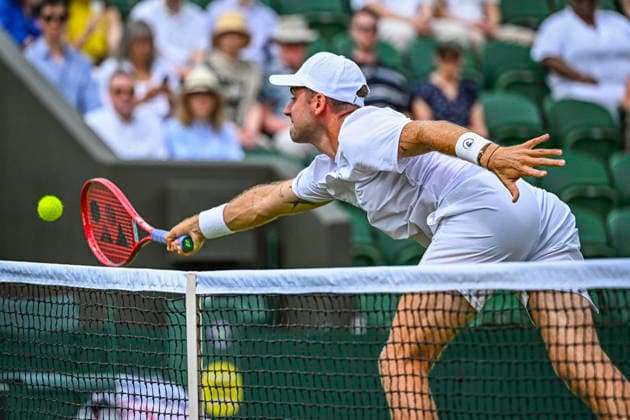 RECORD DATE NOT STATED 5th July 2026; All England Lawn Tennis and Croquet Club, London, England; Wimbledon Tennis Tournament, Day Seven; Patrik Riki (CZE) plays a volley in his third round match with Adam Pavlasek (CZE) against Harri Heliovaara (FIN) and Henry Patten (GBR) GodfreyxPitt