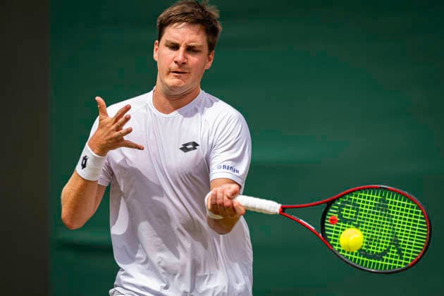 RECORD DATE NOT STATED 5th July 2026; All England Lawn Tennis and Croquet Club, London, England; Wimbledon Tennis Tournament, Day Seven; Henry Patten (GBR) plays a forehand in his third round match with Harri Heliovaara (FIN) against Adam Pavlasek (CZE) and Patrik Riki (CZE) GodfreyxPitt