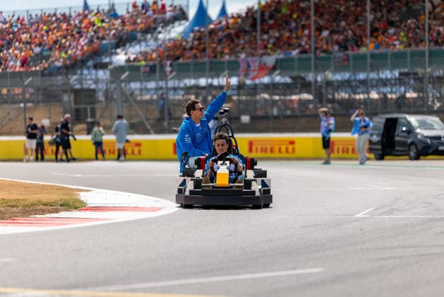July 5, 2026, Silverstone, Northamptonshire, United Kingdom: ARVID LINDBLAD (41, Visa Cash App Racing Bulls F1 Team, GBR, British F1 Driver, VCARB 03) GEORGE RUSSELL (63, Mercedes AMG Petronas F1 Team, GBR, British F1 Driver, W17) with LEGO Karts during the drivers parade on race day (Sunday) at the Formula 1 Pirelli British Grand Prix 2026 at Silverstone Circuit Silverstone United Kingdom - ZUMAr193 20260705_zsp_r193_084 Copyright: xSaraxRuffonix