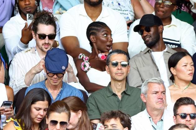 pencer Hewett, Michaela Coel and Malachy Kirby watching the action on Centre Court Wimbledon Tennis Championships, Day 7, The All England Lawn Tennis and Croquet Club, London, UK - 05 Jul 2026London The All England Lawn Tennis and United Kingdom  Copyright: xKieranxMcManus Shutterstockx 16976813bq