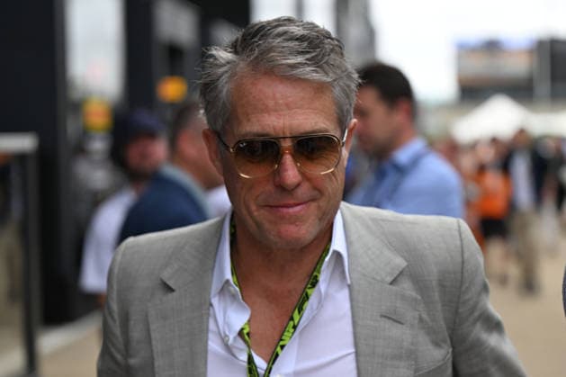 RECORD DATE NOT STATED 5th July 2026; Silverstone Circuit, Northamptonshire, England; FIA Formula 1 2026 British F1 Grand Prix; Race Day; Hugh Grant in the paddock SimonxWest
