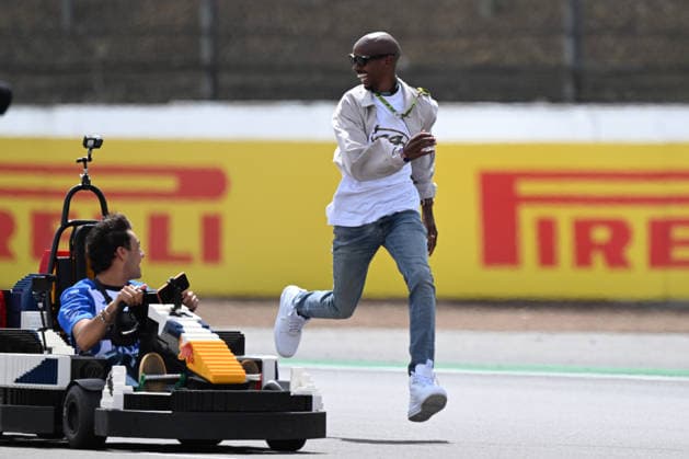 RECORD DATE NOT STATED 5th July 2026; Silverstone Circuit, Northamptonshire, England; FIA Formula 1 2026 British F1 Grand Prix; Race Day; Arvid Lindblad of Racing Bulls is joined by Mo Farrah during the lego car race SimonxWest