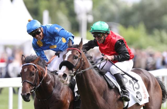 05.07.2026, GER,Reitsport, Rennen 8 IDEE 157. Deutsches Derby , Derby Meeting Hamburg - Galopprennen, Hamburger Renn-Club e.V., Galopprennbahn Hamburg Horn, Hamburg Der drittplatzierte Salitos (IRE) ( 03) geritten von Bauyrzhan Murzabayev klatscht mit dem Sieger des 157. Deutsches Derby Dardanos ( 15) geritten von Wladimir Panov ab *** July 5, 2026, GER, Equestrian Sports, Race 8 IDEE 157 German Derby, Derby Meeting Hamburg Horse Race, Hamburger Renn Club e.V., Hamburg Horn Racetrack, Hamburg: Salitos IRE 03, who finished third, ridden by Bauyrzhan Murzabayev, high-fives the winner of the 157th German Derby, Dardanos 15, ridden by Wladimir Panov nordphotoxGmbHx xTauchnitz nph00059