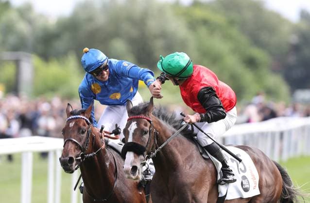 05.07.2026, GER,Reitsport, Rennen 8 IDEE 157. Deutsches Derby , Derby Meeting Hamburg - Galopprennen, Hamburger Renn-Club e.V., Galopprennbahn Hamburg Horn, Hamburg Der drittplatzierte Salitos (IRE) ( 03) geritten von Bauyrzhan Murzabayev klatscht mit dem Sieger des 157. Deutsches Derby Dardanos ( 15) geritten von Wladimir Panov ab *** July 5, 2026, GER, Equestrian Sports, Race 8 IDEE 157 German Derby, Derby Meeting Hamburg Horse Race, Hamburger Renn Club e.V., Hamburg Horn Racetrack, Hamburg: Salitos IRE 03, who finished third, ridden by Bauyrzhan Murzabayev, high-fives the winner of the 157th German Derby, Dardanos 15, ridden by Wladimir Panov nordphotoxGmbHx xTauchnitz nph00059