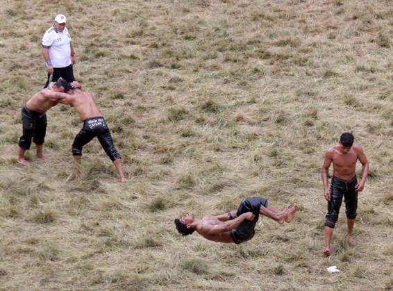 665th Historic Kirkpinar Oil Wrestling Festival in Turkiye s Edirne EDIRNE, TURKIYE - JULY 5: Aydincan Gumusdag (2nd R) celebrates after winning his bout during the 665th Historic Kirkpinar Oil Wrestling Festival at the Sarayici Er Meydani wrestling grounds in Edirne, Turkiye, on July 5, 2026. Ozgun Tiran Anadolu Edirne Turkey. Editorial use only. Please get in touch for any other usage.  Copyright: x2026xAnadoluxOzgunxTiranx