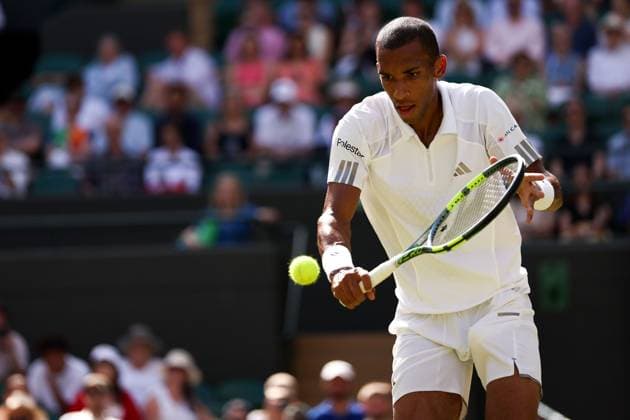 Felix Auger-Aliassime during his Round of 16 match Wimbledon Tennis Championships, Day 7, The All England Lawn Tennis and Croquet Club, London, UK - 05 Jul 2026London The All England Lawn Tennis and United Kingdom  Copyright: xEllaxLing Shutterstockx 16976808ah