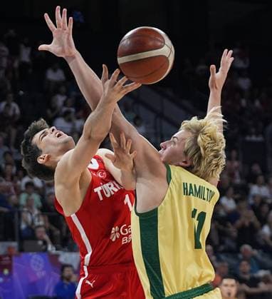 Turkiye v Australia - FIBA U17, U 17 Basketball World Cup ISTANBUL, TURKIYE - JULY 5: Demir Ozturk (1) of Turkiye in action against William Hamilton (11) of Australia during the FIBA Under-17 Basketball World Cup third-place game between Turkiye and Australia at the Basketball Development Center in Istanbul, Turkiye, on July 5, 2026. Esra Bilgin Anadolu Istanbul Turkey. Editorial use only. Please get in touch for any other usage.  Copyright: x2026xAnadoluxEsraxBilginx