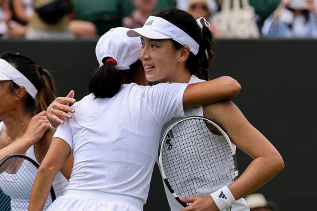 (260705) -- LONDON, July 5, 2026 -- Wang Xinyu (R) embraces Zhang Shuai after the women s doubles second round match between Wang Xinyu (China) Hsieh Su-Wei(Chinese Taipei) and Zhang Shuai (China) Elise Mertens(Belgium) at the Wimbledon Tennis Championships in London, Britain, on July 5, 2026. (Photo by Xinhua) (SP)BRITAIN-LONDON-TENNIS-WIMBLEDON-WOMEN S DOUBLES DinendraxHaria 