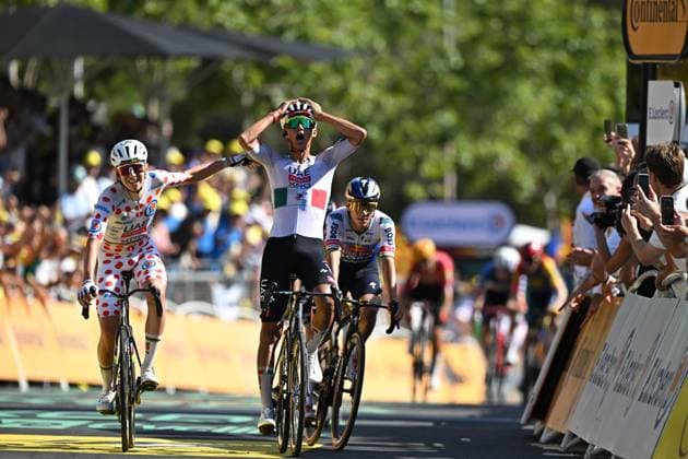 Slovenian Tadej Pogacar of UAE Team Emirates-XRG, Mexican Isaac Del Toro of UAE Team Emirates-XRG and pictured as they crosses the finish line of the second stage of the 2026 Tour de France cycling race, a stage of 182km from Tarragona to Barcelona, Sunday 05 July 2026. The 113th edition of the Tour de France starts on Saturday 4 July in Barcelona, Spain, and will finish in Paris, France on the 26th of July. DAVIDxPINTENS  x180438756x