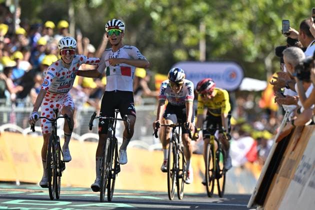 Slovenian Tadej Pogacar of UAE Team Emirates-XRG, Mexican Isaac Del Toro of UAE Team Emirates-XRG and pictured as they cross the finish line of the second stage of the 2026 Tour de France cycling race, a stage of 182km from Tarragona to Barcelona, Sunday 05 July 2026. The 113th edition of the Tour de France starts on Saturday 4 July in Barcelona, Spain, and will finish in Paris, France on the 26th of July. DAVIDxPINTENS  x180439258x
