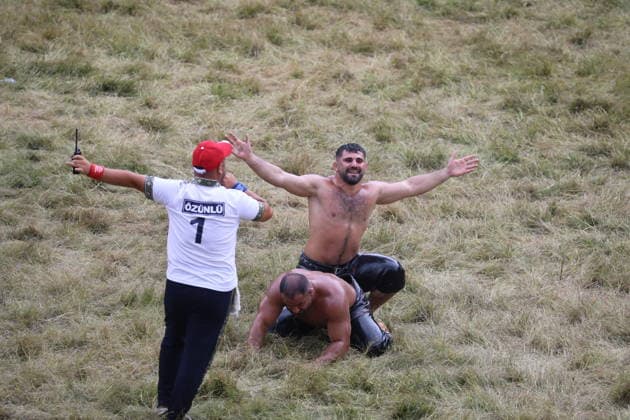 Erkan Tas wins chief wrestler title at 665th Historic Kirkpinar Oil Wrestling Festival EDIRNE, TURKIYE - JULY 5: Erkan Tas celebrates after defeating Feyzullah Akturk in the final to become the chief wrestler during the 665th Historic Kirkpinar Oil Wrestling Festival at the Sarayici Er Meydani wrestling grounds in Edirne, Turkiye, on July 5, 2026. Hakan Mehmet Sahin Anadolu Edirne Turkey. Editorial use only. Please get in touch for any other usage.  Copyright: x2026xAnadoluxHakanxMehmetxSahinx