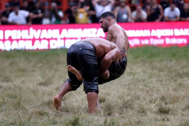 Erkan Tas wins chief wrestler title at 665th Historic Kirkpinar Oil Wrestling Festival EDIRNE, TURKIYE - JULY 5: Erkan Tas competes against Feyzullah Akturk in the final to become the chief wrestler during the 665th Historic Kirkpinar Oil Wrestling Festival at the Sarayici Er Meydani wrestling grounds in Edirne, Turkiye, on July 5, 2026. Ozgun Tiran Anadolu Edirne Turkey. Editorial use only. Please get in touch for any other usage.  Copyright: x2026xAnadoluxOzgunxTiranx