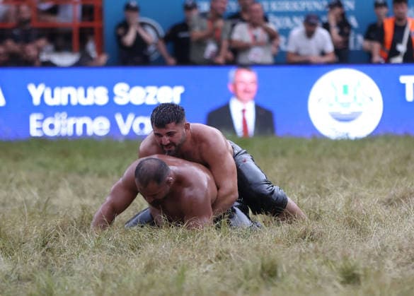 Erkan Tas wins chief wrestler title at 665th Historic Kirkpinar Oil Wrestling Festival EDIRNE, TURKIYE - JULY 5: Erkan Tas (top) defeats Feyzullah Akturk (front) in the final to become the chief wrestler during the 665th Historic Kirkpinar Oil Wrestling Festival at the Sarayici Er Meydani wrestling grounds in Edirne, Turkiye, on July 5, 2026. Ozgun Tiran Anadolu Edirne Turkey. Editorial use only. Please get in touch for any other usage.  Copyright: x2026xAnadoluxOzgunxTiranx