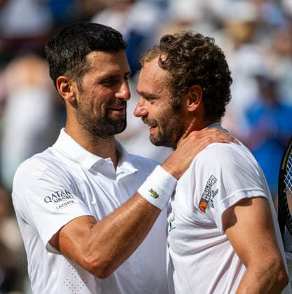 Tennis - Wimbledon Championship 2026 - Day 7 LONDON, ENGLAND - Sunday, July 5, 2026: Novak Djokovic (SRB) (L) and Roman Safiullin (RUS) after the Gentlemen s Singles Fourth Round match on Day Seven of The Championships Wimbledon 2026 at the All England Lawn Tennis and Croquet Club. (Photo by Kirsten Holst Propaganda) LONDON All England Lawn Tennis and Croq GREATER LONDON ENGLAND  Copyright: xKirstenxHolstx 2026-07-05-052-Wimbledon_Day_7