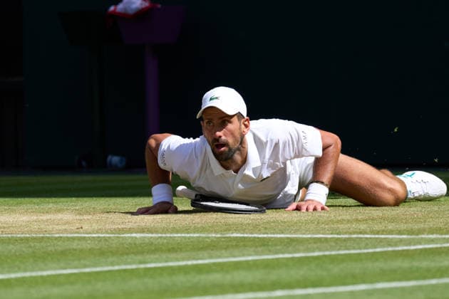 2026 Wimbledon, July 05, Day 7 LONDON, - JULY 5: Novak Djokovic of Serbia slips on Centre court against Roman Safiullin in the fourth round during the 2026 Wimbledon, July 05, Day 7 at The all England club, Wimbledon on July 5, 2026 in London,GBR. London The all England club, Wimbledon GBR Copyright: xPeterxvanxdenxBerg ISIxPhotosx 9462
