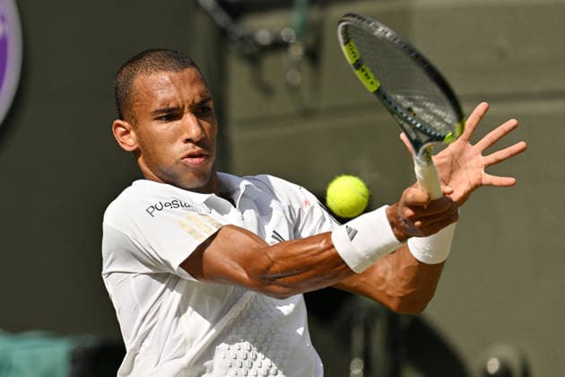 Wimbledon Tennis Championships 2026 - Day 7 LONDON, UNITED KINGDOM - JULY 5: Felix Auger-Aliassime of Canada plays in the Men s singles fourth round match against Alejandro Davidovich Fokina (not seen) of Spain during day seven of The Wimbledon Tennis Championships at All England Lawn Tennis and Croquet Club on July 05, 2026 in London, United Kingdom. Ray Tang Anadolu London United Kingdom. Editorial use only. Please get in touch for any other usage.  Copyright: x2026xAnadoluxRayxTangx