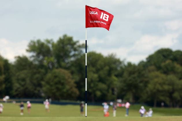 U.S. Senior Open Championship COLUMBUS, OHIO - JULY 5: The flag on the 18th hole floats in the breeze as group ten, including the winner Padraig Harrington approaches from the fairway during the final round of the 46th U.S. Senior Open Championship 2026 at Scioto Country Club in Columbus, Ohio, USA, July 5, 2026. Columbus Ohio United States  Copyright: xAmyxLemusx originalFilename:lemus-ussenior260705_np1nk.jpg