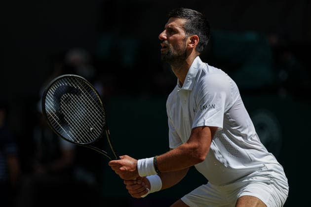 Novak Djokovic (SRB) in action during his match against Roman Safiullin during the Gentlemen™s Singles fourth round at The Championships, Wimbledon at the AELTC, London London All England Lawn Tennis and Croquet Club Wimbledon England, UK NEWSPAPERS OUT Copyright: xImmyxThompson-Bland IPSxPhotoxAgencyx