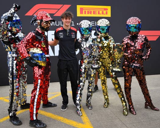 F1 Grand Prix of Great Britain Oliver Bearman of the United Kingdom and TGR Haas F1 Team poses with the mirror people during the Formula 1 Pirelli British Grand Prix 2026 at Silverstone Circuit, Towcester, on July 5, 2026. Towcester Northants United Kingdom  Copyright: xMIxNewsx originalFilename:fletcher-formula1260705_npnNI.jpg