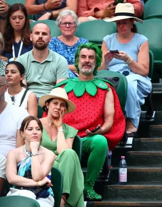 A spectator seen wearing a strawberry outfit. Wimbledon Tennis Championships, Day 7, The All England Lawn Tennis and Croquet Club, London, UK - 05 Jul 2026London The All England Lawn Tennis and United Kingdom  Copyright: xJamesxMarsh Shutterstockx 16976811hn