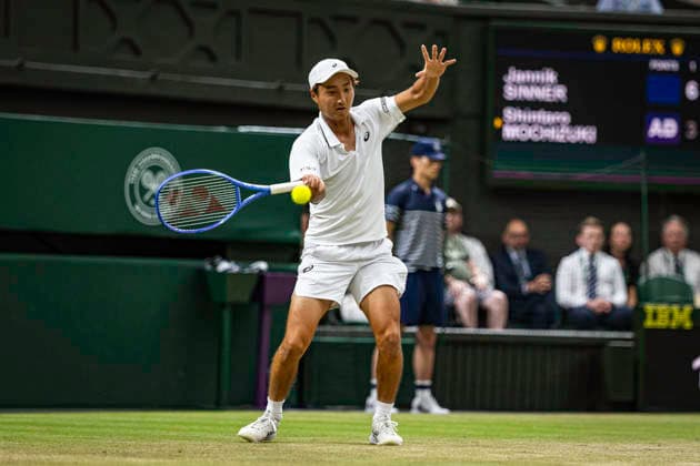 RECORD DATE NOT STATED 5th July 2026; All England Lawn Tennis and Croquet Club, London, England; Wimbledon Tennis Tournament, Day Seven; Shintaro Mochizuki (JPN) plays a forehand in his fourth round match against Jannik Sinner (ITA) GodfreyxPitt