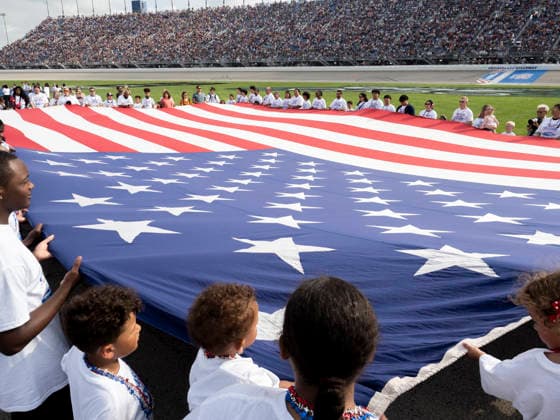 JOLIET, IL - JULY 05: A general view of the American Flag during the National Anthem before the NASCAR, Motorsport, USA Cup Series eero 400 on July 5, 2026, at Chicagoland Speedway in Joliet, IL. (Photo by Joseph Weiser Icon Sportswire) AUTO: JUL 05 NASCAR Cup Series eero 400 EDITORIAL USE ONLY Icon260705029400