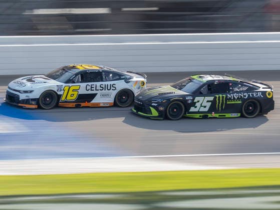 JOLIET, IL - JULY 05: AJ Allmendinger ( 16 Kaulig Racing Celsius Chevrolet) battles Riley Herbst ( 35 23XI Racing Monster Energy Zero Sugar Toyota) for position during the NASCAR, Motorsport, USA Cup Series eero 400 on July 5, 2026, at Chicagoland Speedway in Joliet, IL. (Photo by Joseph Weiser Icon Sportswire) AUTO: JUL 05 NASCAR Cup Series eero 400 EDITORIAL USE ONLY Icon260705037400
