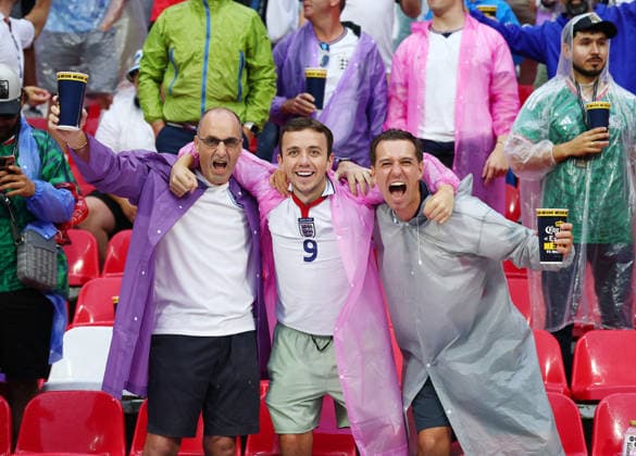 England fans wear rain jackets as thunderstorms delay the start of a Round of 16 FIFA World Cup, WM, Weltmeisterschaft, Fussball match against Mexico at Mexico City Stadium in Mexico City, Mexico, on Sunday, July 5, 2026.  MEX20260705802 CHRISTIANxBRUNSKILL