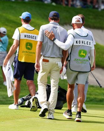 SILVIS, IL - JULY 05: PGA, Golf Herren golfer Beth Kohles is consoled by his caddie walking off the 18th green after making a double bogey on the 18th hole and losing the lead during the final round of the John Deere Classic on July 5, 2026, at TPC Deere Run in Silvis, Illinois. (Photo by Brian Spurlock Icon Sportswire) GOLF: JUL 05 PGA John Deere Classic EDITORIAL USE ONLY Icon26070577