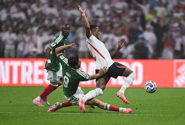(260706) -- MEXICO CITY, July 6, 2026 -- Raul Jimenez (C) of Mexico vies with Ezri Konsa of England (R) during the round of 16 match between Mexico and England at the 2026 FIFA World Cup, WM, Weltmeisterschaft, Fussball at the Mexico City Stadium, Mexico, July 5, 2026. ) (SP)MEXICO-MEXICO CITY-FOOTBALL-FIFA WORLD CUP-ROUND OF 16-MEX VS ENG WuxWei 