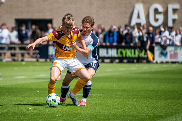 Aarhus GF v Motherwell FC, pre-season test match, Aarhus, Denmark Aarhus, Denmark. 05th, July 2026. Oscar Priestman of Motherwell FC and Kristian Arnstad (10) of Aarhus GF seen during a pre-season test match between Aarhus GF and Motherwell FC at the AGF training facility Fredensvang in Aarhus Denmark, Aarhus, Fredensvang  Copyright: xGonzalesxPhoto MortenxKjaerx