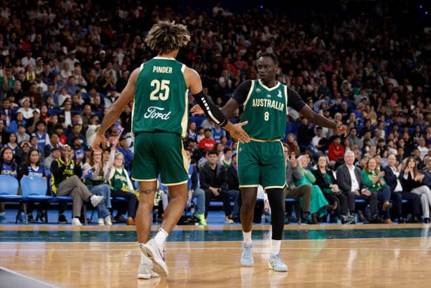 BASKETBALL AUSTRALIA PHILIPPINES, Keanu Pinder and Wani Swaka Lo Buluk of the Australian Boomers celebrate a basket during the World Cup qualifier basketball match between Australia and the Philippines at RAC Arena in Perth, Monday, July 6, 2026. ( NO ARCHIVING, EDITORIAL USE ONLY PERTH WESTERN AUSTRALIA AUSTRALIA  Copyright: xRICHARDxWAINWRIGHTx 20260706167597932446