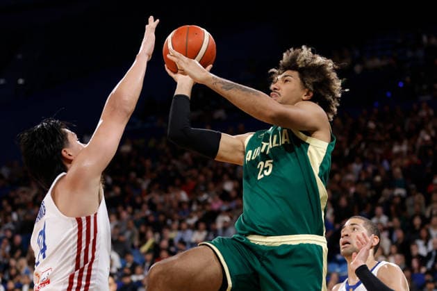 BASKETBALL AUSTRALIA PHILIPPINES, Keanu Pinder of the Australian Boomers drives to the basket during the World Cup qualifier basketball match between Australia and the Philippines at RAC Arena in Perth, Monday, July 6, 2026. ( NO ARCHIVING, EDITORIAL USE ONLY PERTH WESTERN AUSTRALIA AUSTRALIA  Copyright: xRICHARDxWAINWRIGHTx 20260706139636967385