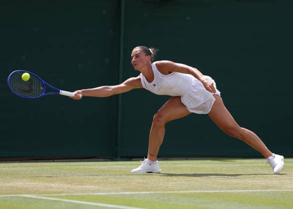 6th July 2026; All England Lawn Tennis and Croquet Club, London, England; Wimbledon Tennis Tournament, Day Eight; Ashlyn Krueger (USA) with a forehand shot to Marta Kostyuk (UKR) JohnxPatrickxFletcher