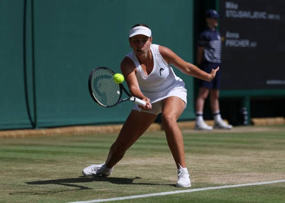 6th July 2026; All England Lawn Tennis and Croquet Club, London, England; Wimbledon Tennis Tournament, Day Eight; Anna Bircher (AUS) with a forehand shot to Mika Stojsavljevic (GBR) JohnxPatrickxFletcher