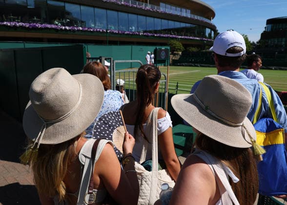 6th July 2026; All England Lawn Tennis and Croquet Club, London, England; Wimbledon Tennis Tournament, Day Eight; Spectators observing players train on the outer courts JohnxPatrickxFletcher